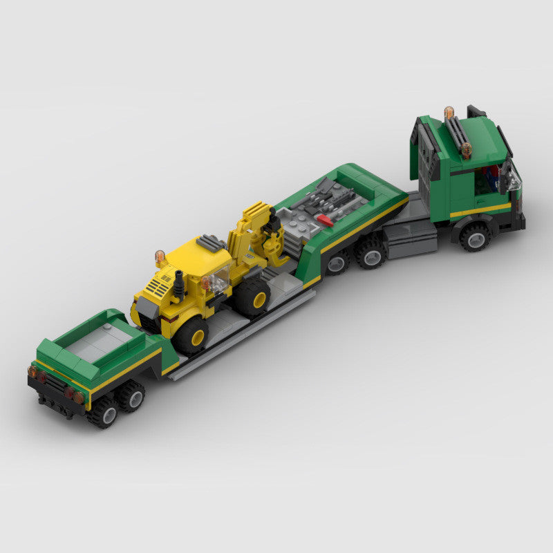 Lorry with digger on trailer